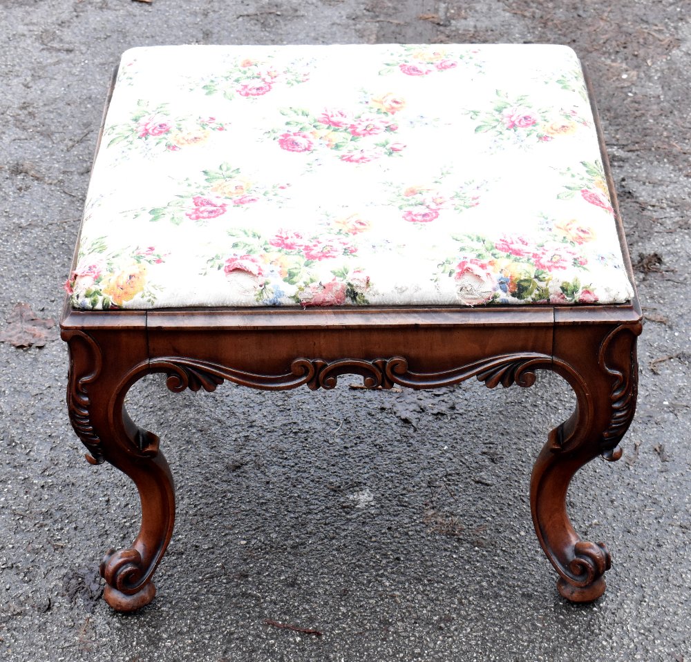 A Victorian carved mahogany stool with floral seat, on cabriole legs, height 37cm