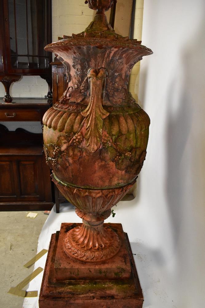 A pair of large ornate terracotta twin handled lidded urns, height 153cm. - Image 6 of 7