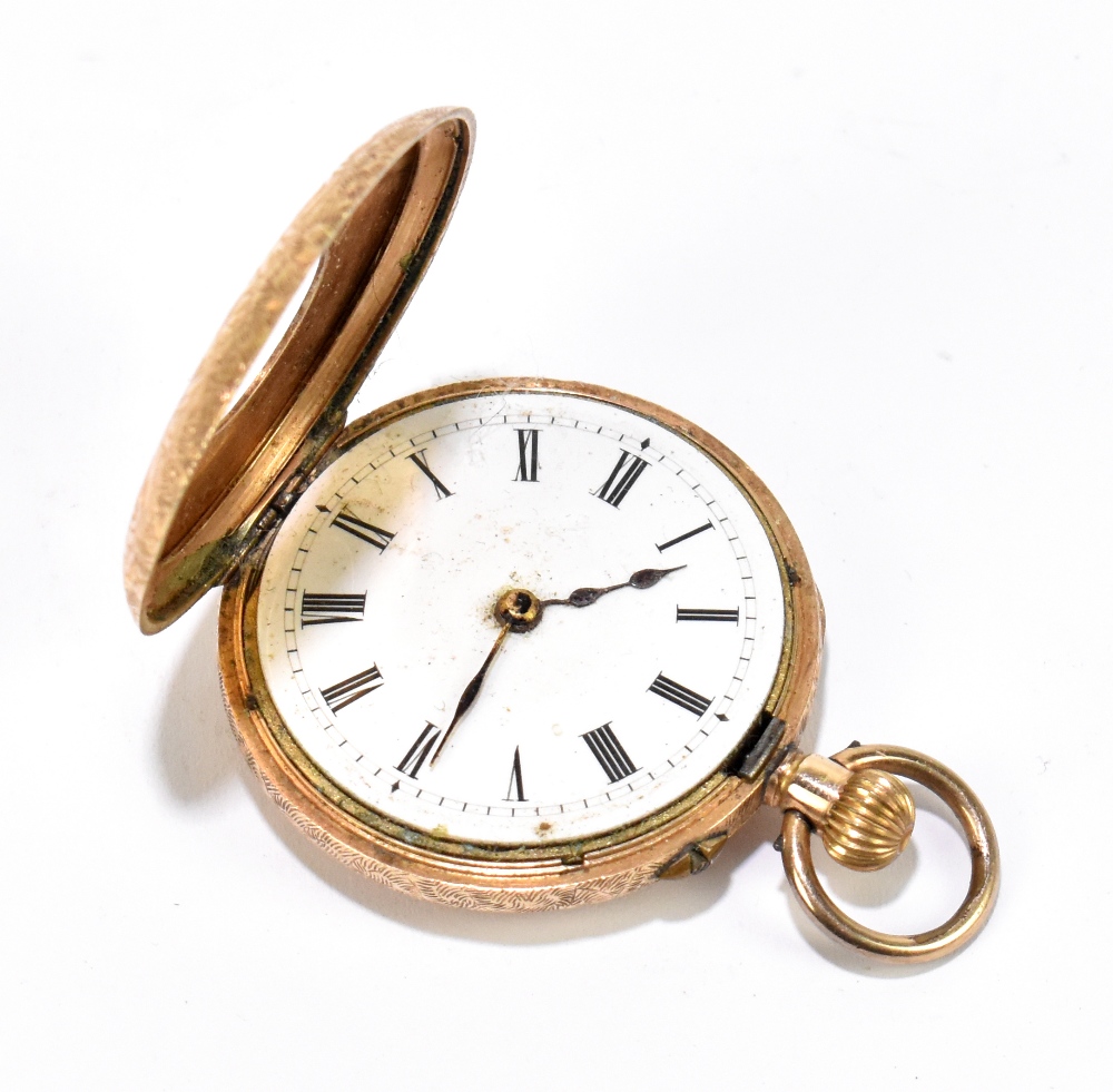 A lady's 14ct yellow gold half hunter crown wind fob watch, with remains of enamel outer dial