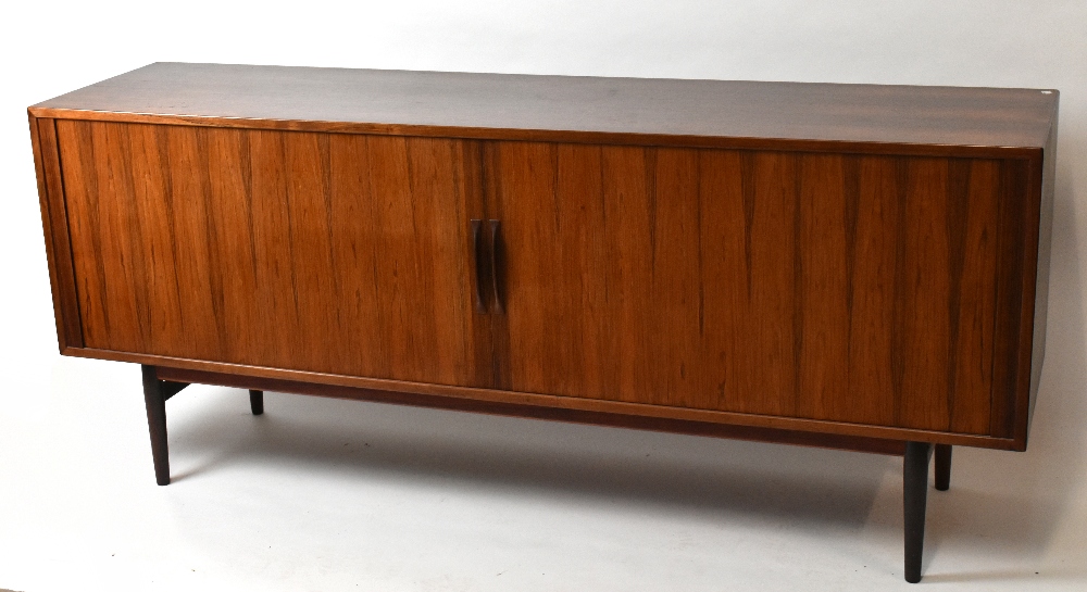 A 1970s Danish rosewood sideboard, with two sliding doors, height 80cm, length 190cm, depth 47cm.