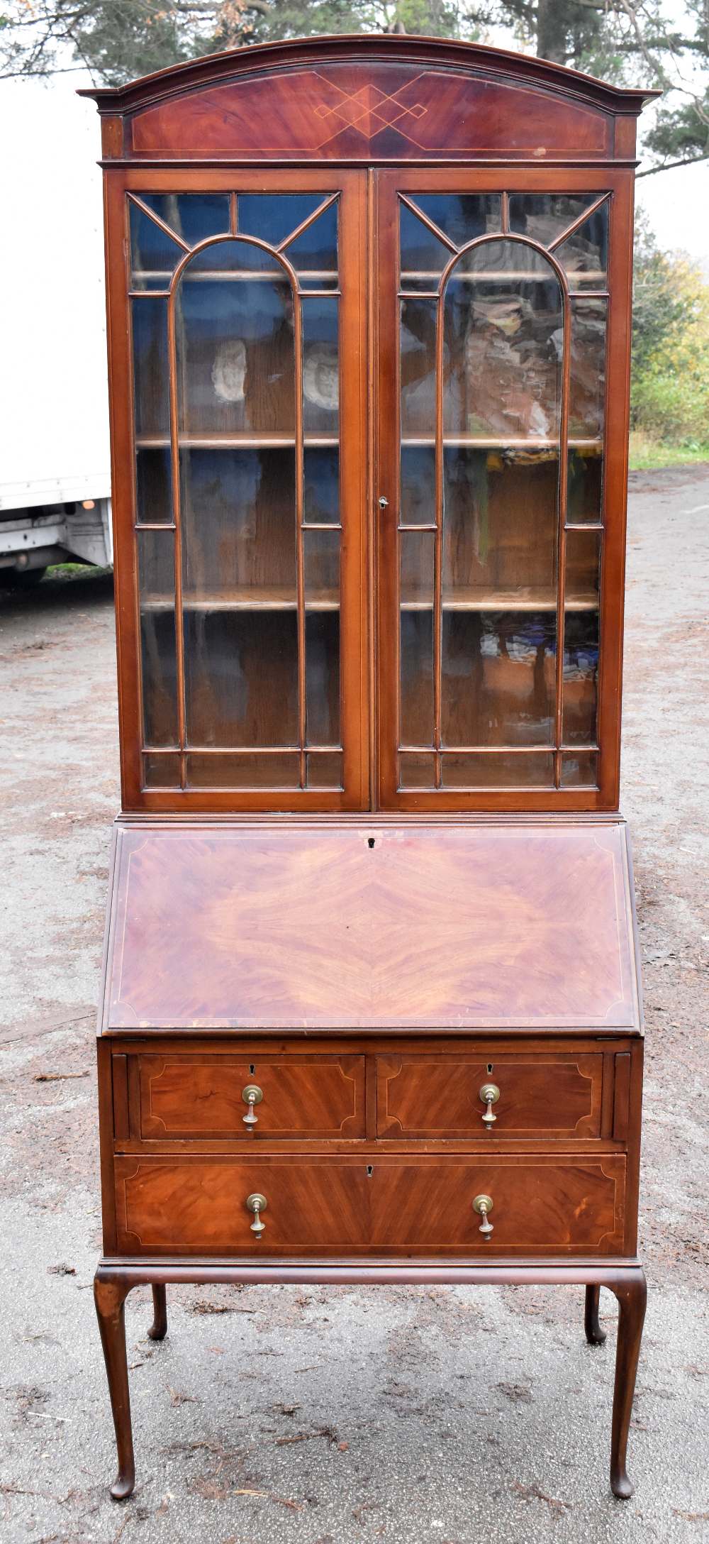 A late 19th century inlaid mahogany bureau bookcase, the upper section with two glazed doors, height