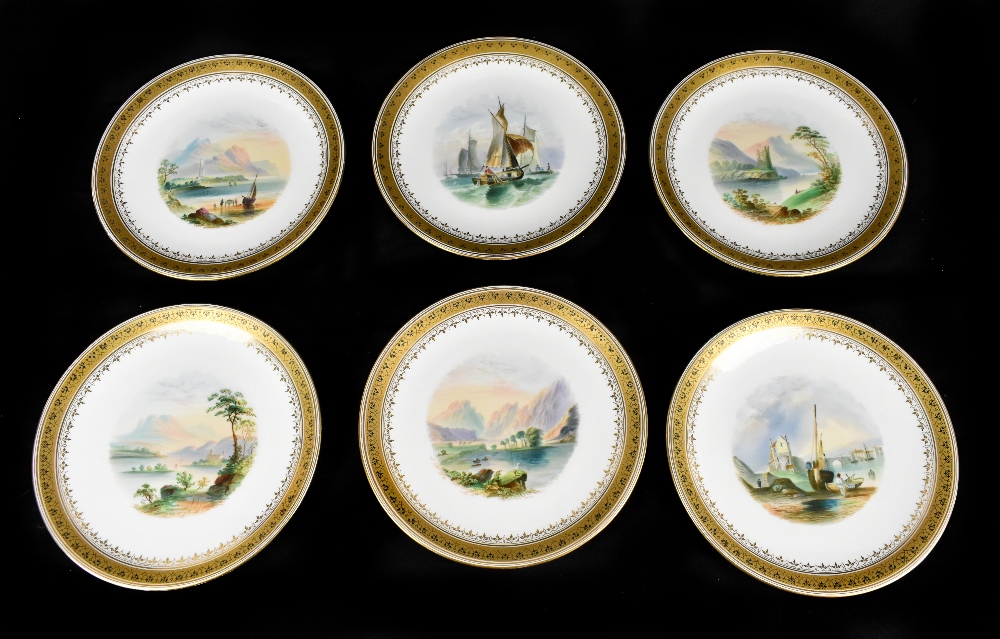 A suite of six 19th century English porcelain dessert plates each decorated with a central hand
