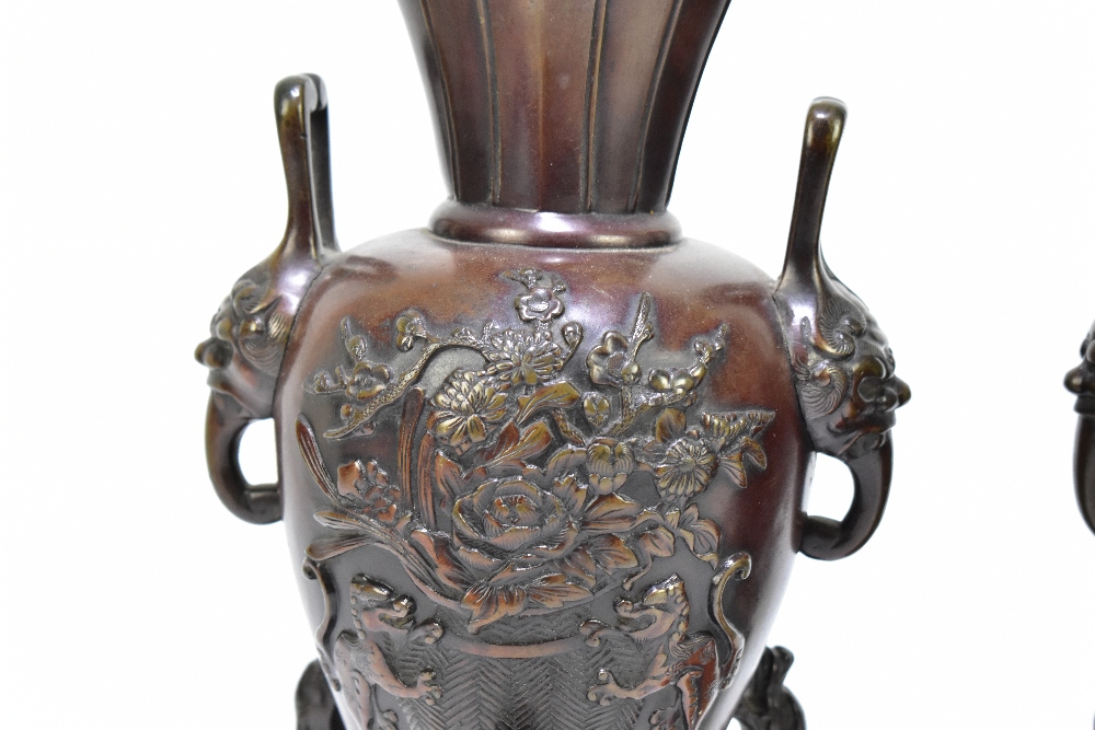 A pair of Japanese Meiji Period bronze koros with applied mask head handles and floral sprays, - Image 2 of 5