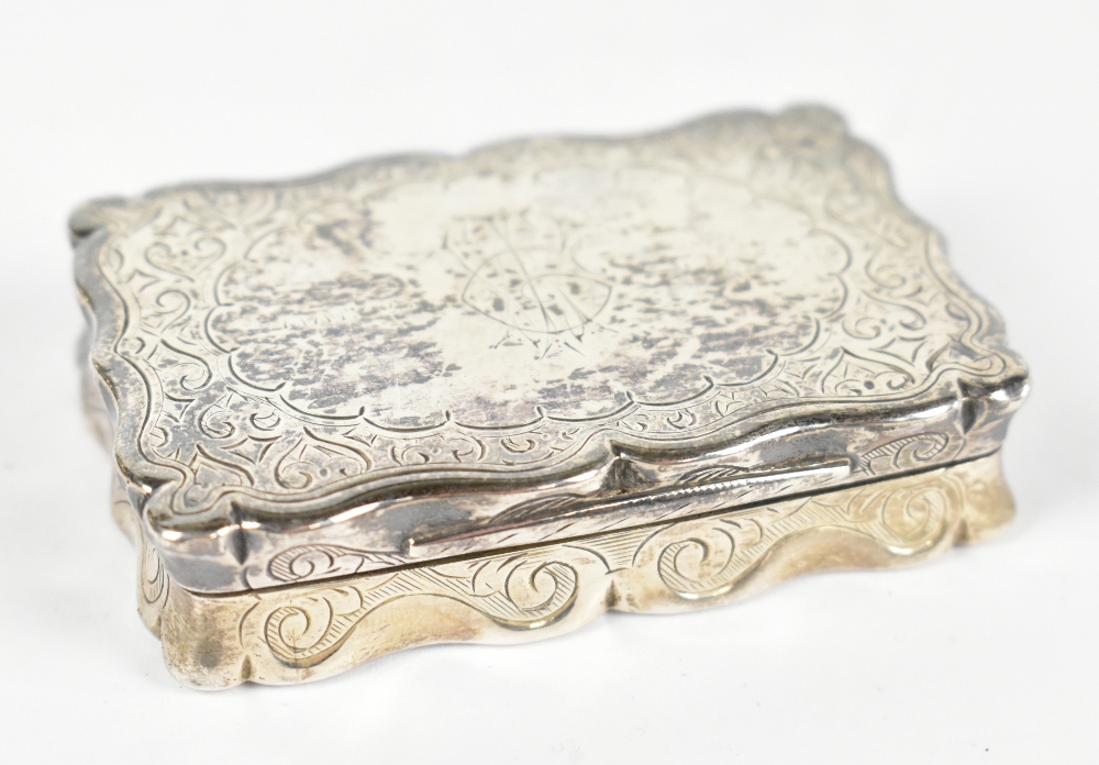 FREDERICK MASON; a Victorian hallmarked silver serpentine snuff box, with engraved detailing,