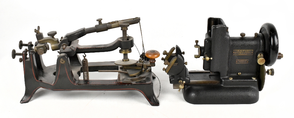 JUNG HEIDELBERG; a cast iron and brass microtome, with sprung mechanism and turned wood handle,