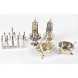 A collection of hallmarked silver items, including a George V silver four division toast rack,