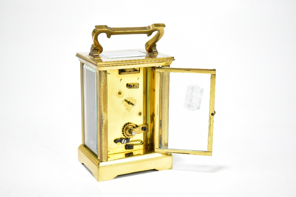A brass cased carriage clock with rectangular white enamel dial set with Roman numerals, height - Image 3 of 3