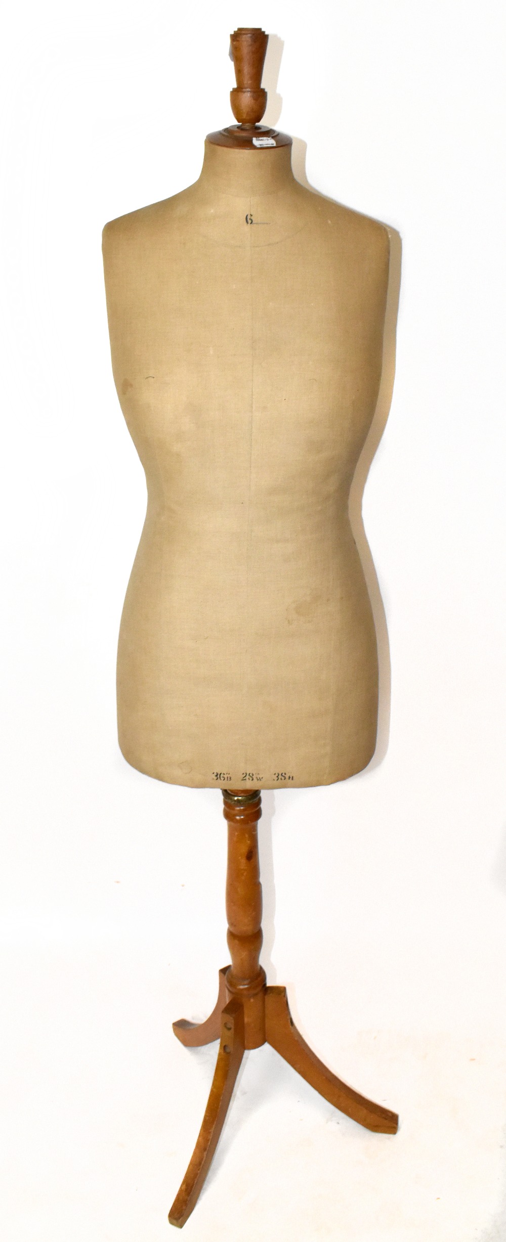 An early 20th century c.1900 French mannequin/tailor's dummy, with beige cloth to body and solid