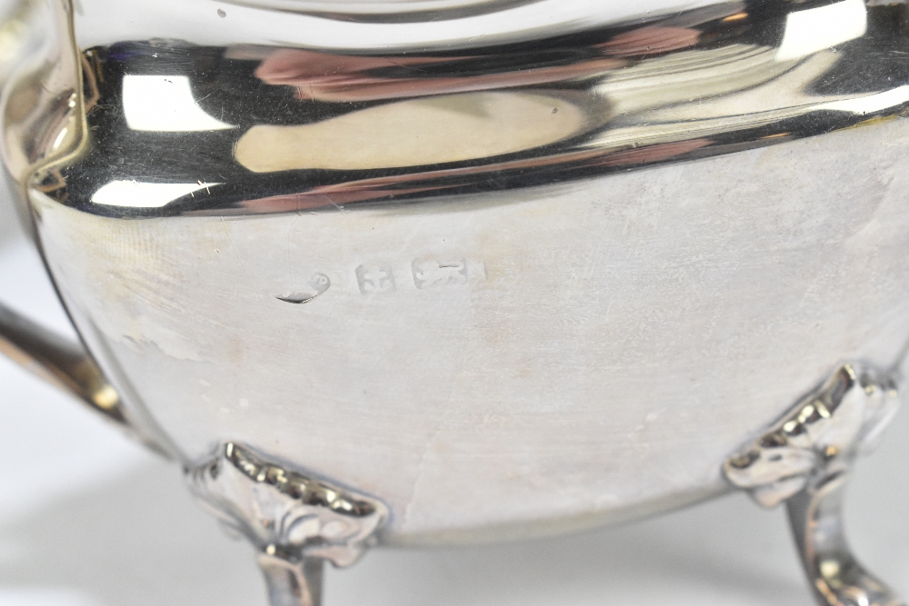 ADIE BROS; a George VI hallmarked silver three piece tea service of shaped oval form, on four - Image 4 of 6