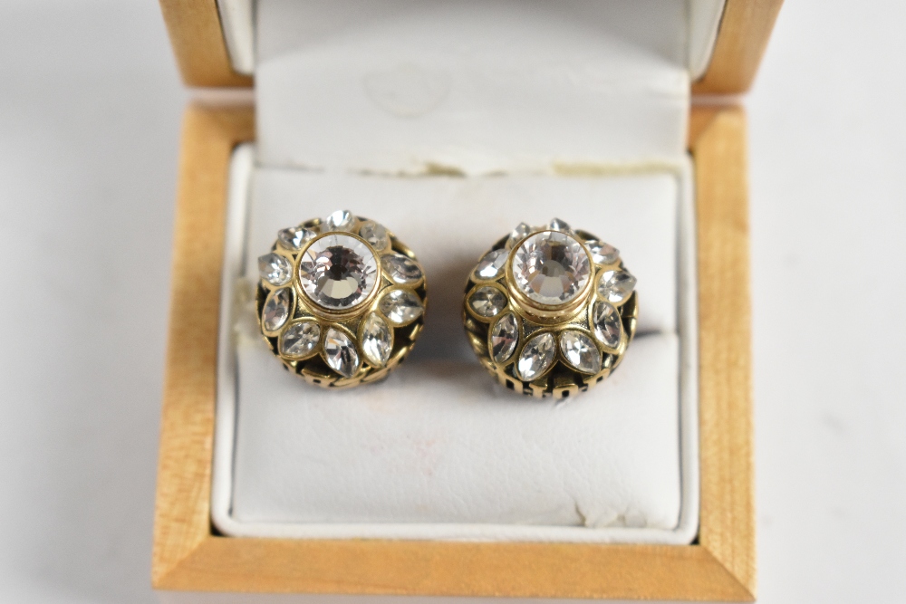 CHRISTIAN DIOR; a pair of gold tone Tribales pierced earrings with maker's logo around a sphere of - Image 2 of 3