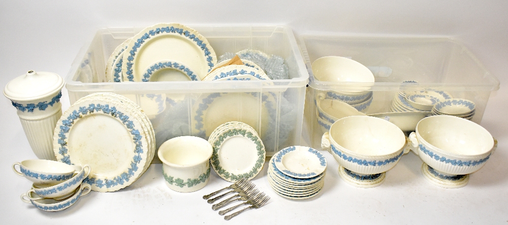 WEDGWOOD; a large collection of white Queen's Ware, including four footed bowls, various plates,