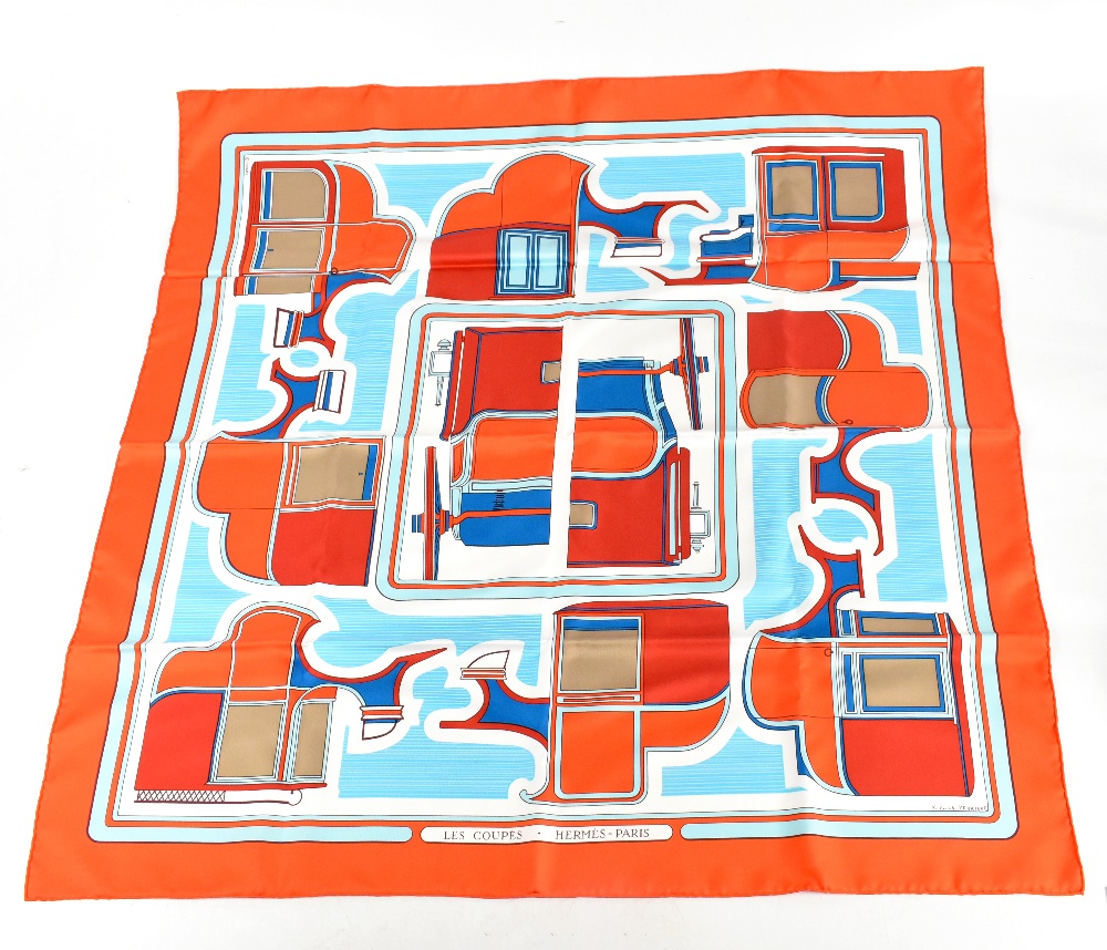 HERMES; a 100% silk orange, blue and red Les Coupes scarf by Francoise de la Perriere, unused and