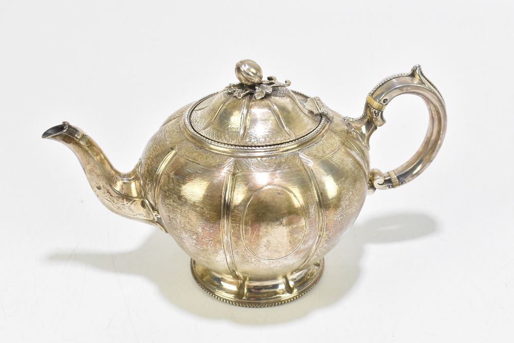 MARTIN, HALL & CO; a Victorian silver three piece tea service, the teapot with fruit and leaf - Image 4 of 7