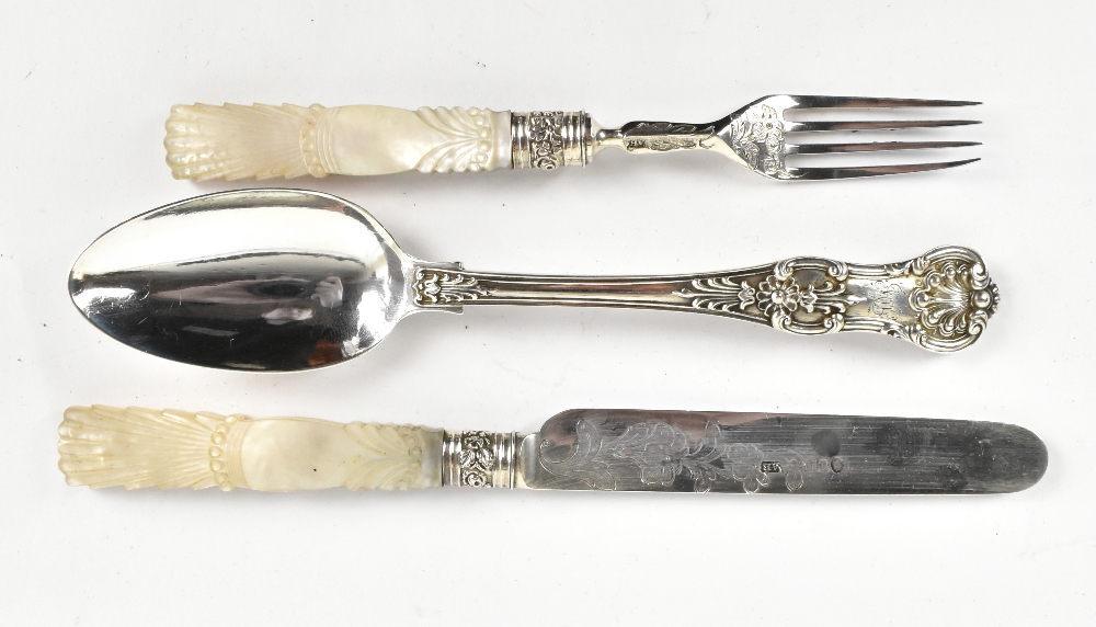 AARON HADFIELD; a Victorian hallmarked silver three piece christening set comprising spoon, silver