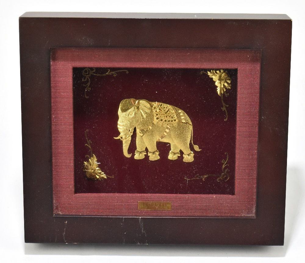 PRIMA ART; a gilt metal elephant, with applied floral detail, framed and glazed, 17.5cm x 20cm