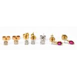 Three pairs of 9ct yellow gold earrings and a single 9ct white gold earring.