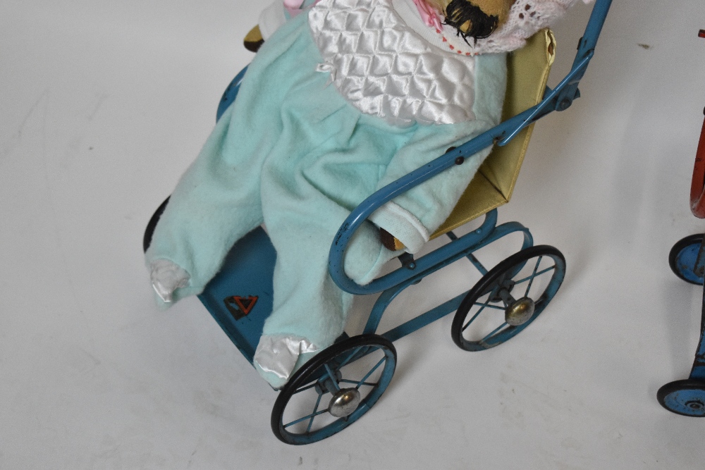TRI-ANG; a vintage metal doll's pram, height 59cm, with a similar child's mangle, and a teddy - Image 3 of 3