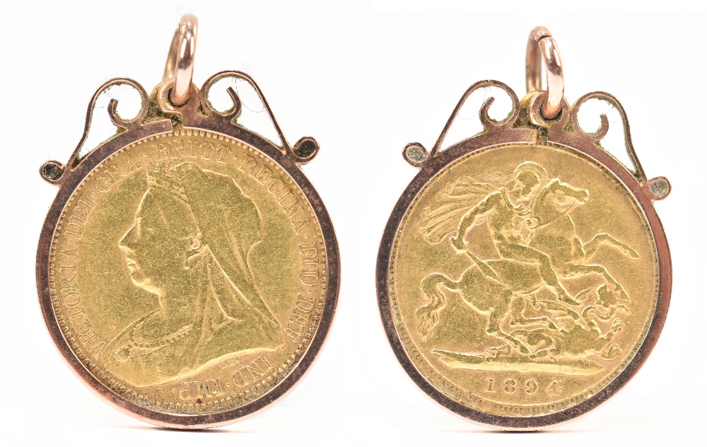 A Victoria half sovereign, old head, 1894, in 9ct rose gold scroll mount, approx 5.1g.Additional