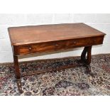 A 19th century rosewood library table, the rounded rectangular top above two frieze drawers, on lyre