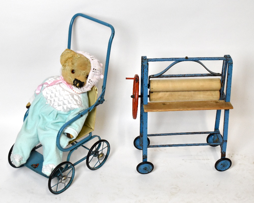 TRI-ANG; a vintage metal doll's pram, height 59cm, with a similar child's mangle, and a teddy