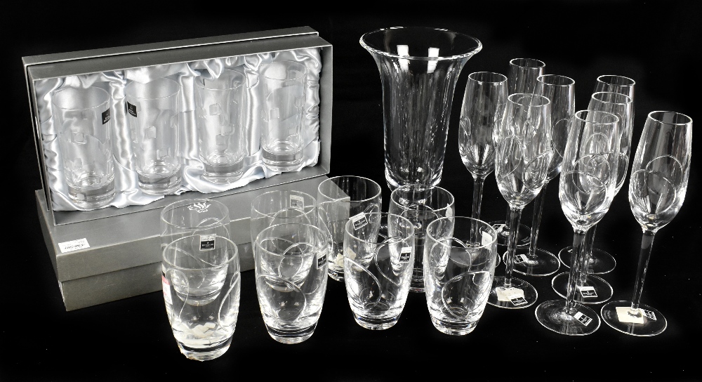 JOHN ROCHA FOR WATERFORD CRYSTAL; two boxed sets of four champagne flutes and two boxes of four