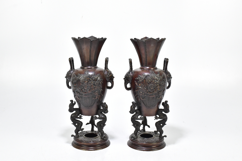 A pair of Japanese Meiji Period bronze koros with applied mask head handles and floral sprays, - Image 4 of 5