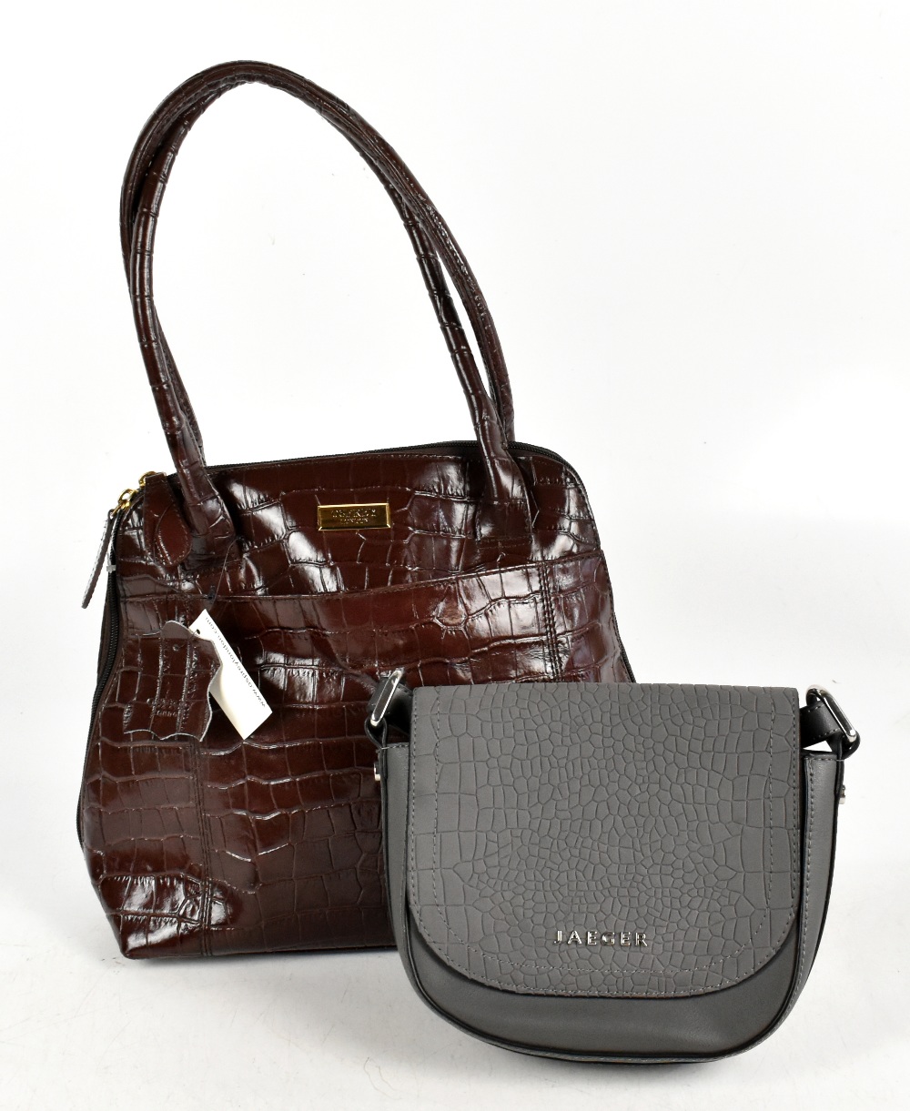 OSPREY; an unused brown crocodile embossed leather handbag with two top handles, gold tone maker's