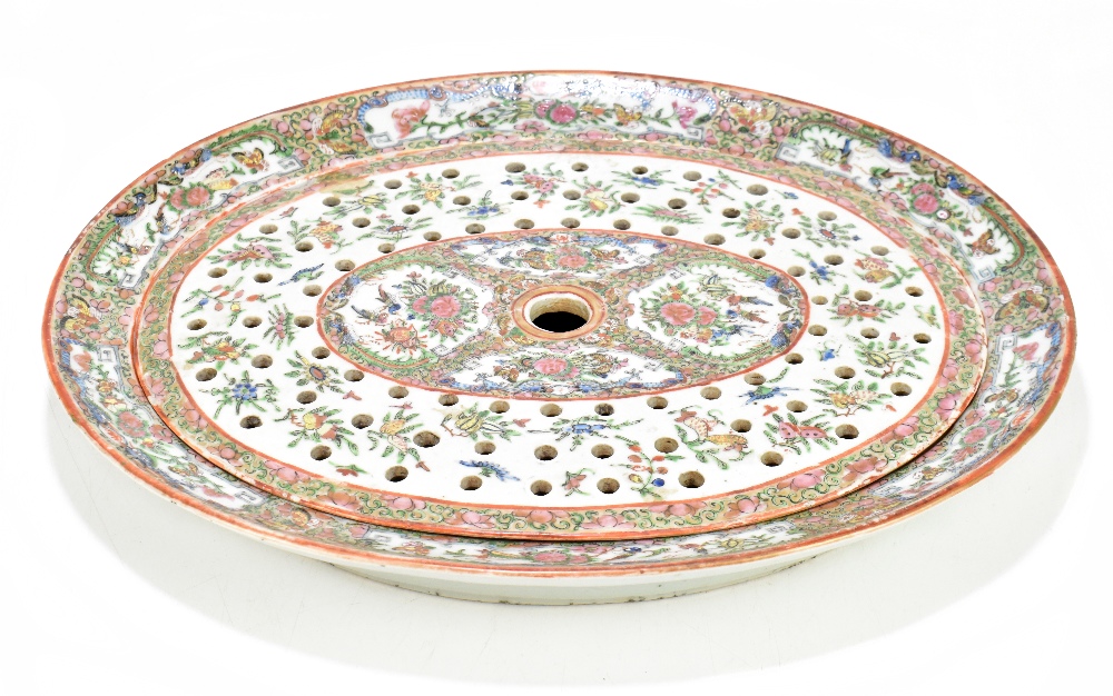 A 19th century Canton Chinese Famille Rose porcelain meat drainer and bowl of oval form, painted