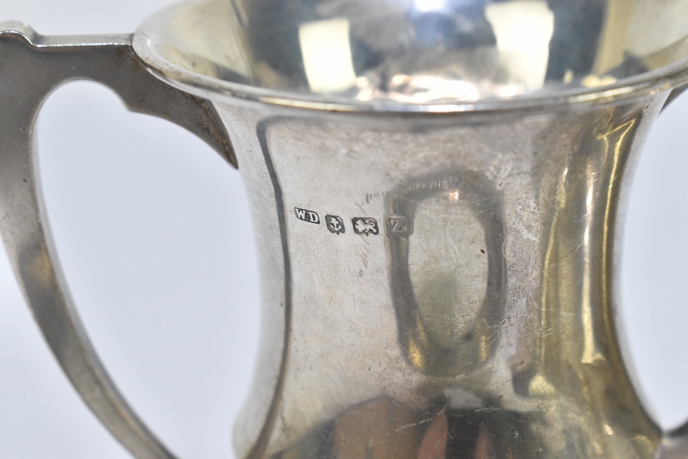 A late Victorian hallmarked silver twin handled trophy, Birmingham 1899, height 10cm, with a - Image 3 of 5
