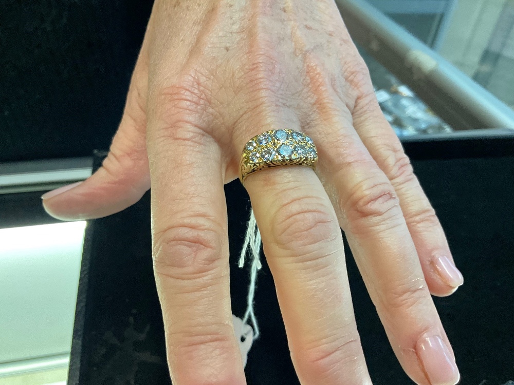 An 18ct yellow gold and diamond fourteen stone twin row graduated diamond ring, the two largest - Image 4 of 4