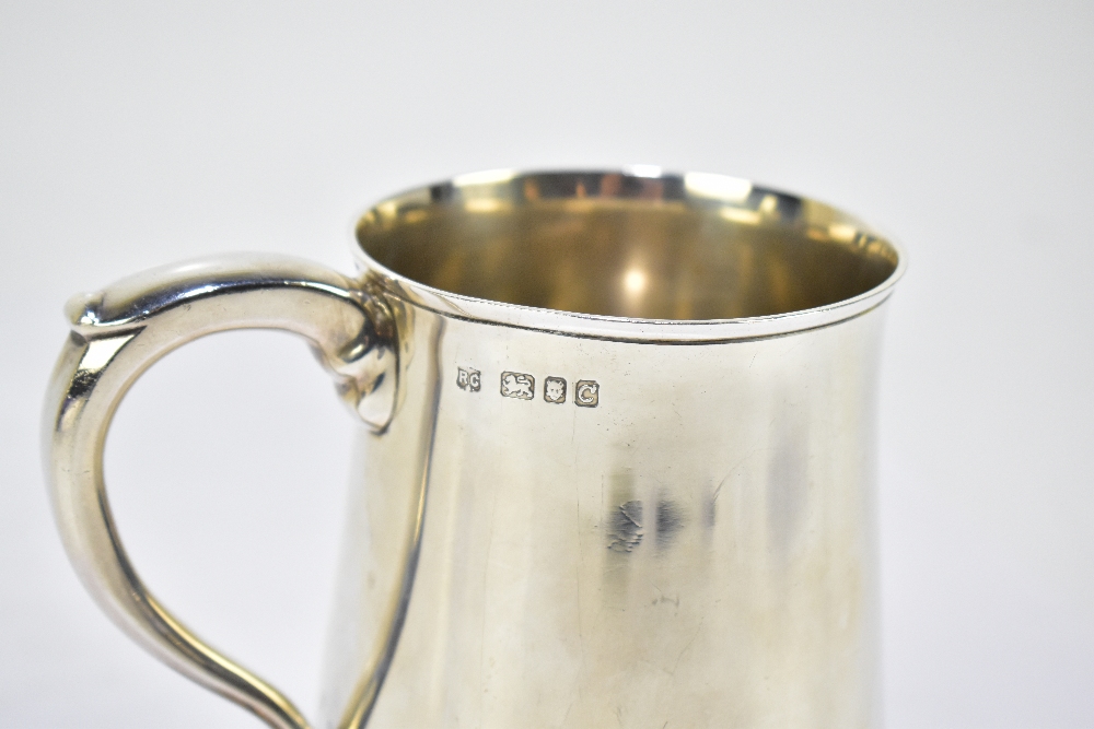 WILLAM COMYNS & SONS LTD; an Elizabeth II hallmarked silver mug of tapering cylindrical form, London - Image 3 of 3