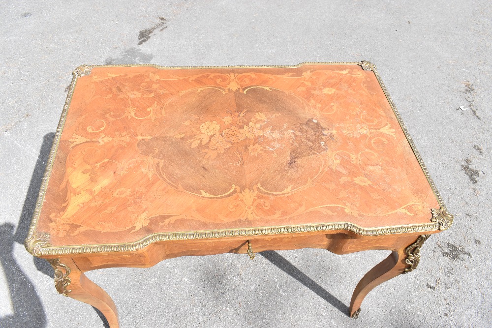 An early 20th century French inlaid kingwood inverted breakfront writing table with gilt metal - Image 2 of 4