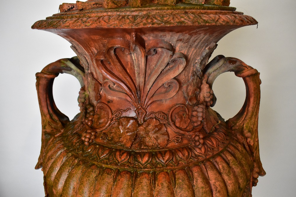 A pair of large ornate terracotta twin handled lidded urns, height 153cm. - Image 3 of 7