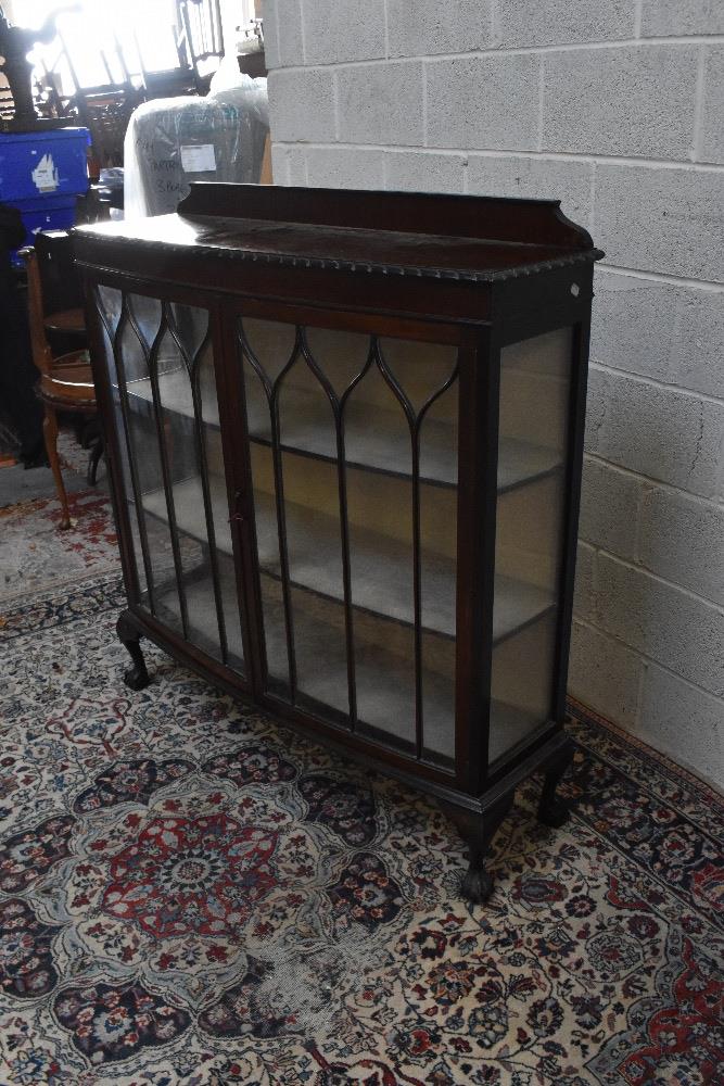 An early 20th century mahogany bowfront display cabinet, the pair of glazed doors enclosing two - Image 4 of 4