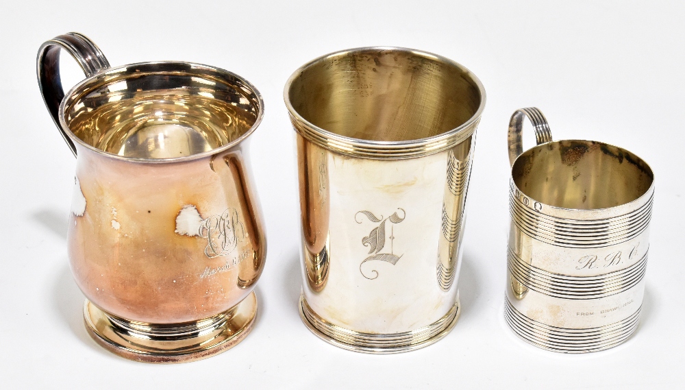A George III hallmarked silver christening mug of cylindrical form with banded decoration and