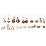 Eleven pairs of yellow metal and white metal earrings, combined weight approximately 24g. Additional