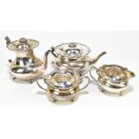 COOPER BROS & SONS; an Elizabeth II hallmarked silver four piece tea service, the teapot and hot