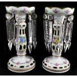 A pair of 20th century Bohemian overlaid glass table lustres with floral decoration and cut glass