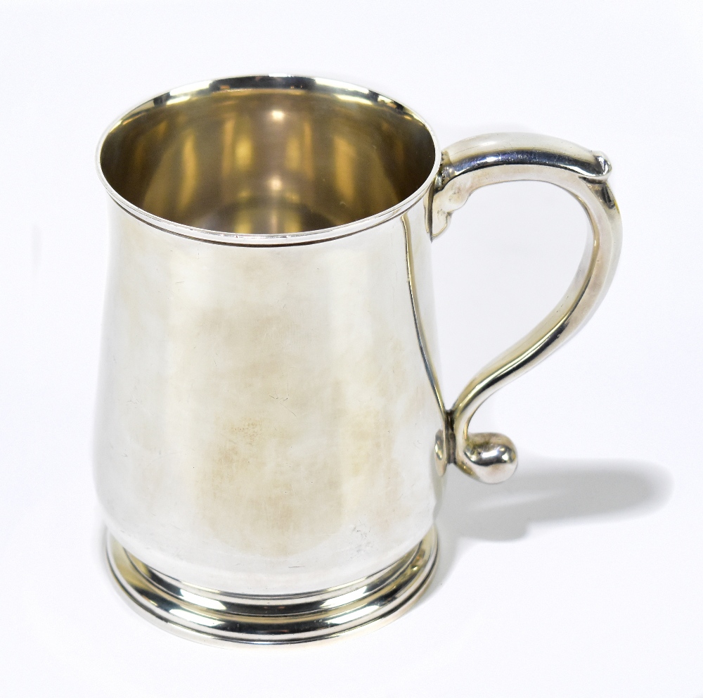 WILLAM COMYNS & SONS LTD; an Elizabeth II hallmarked silver mug of tapering cylindrical form, London