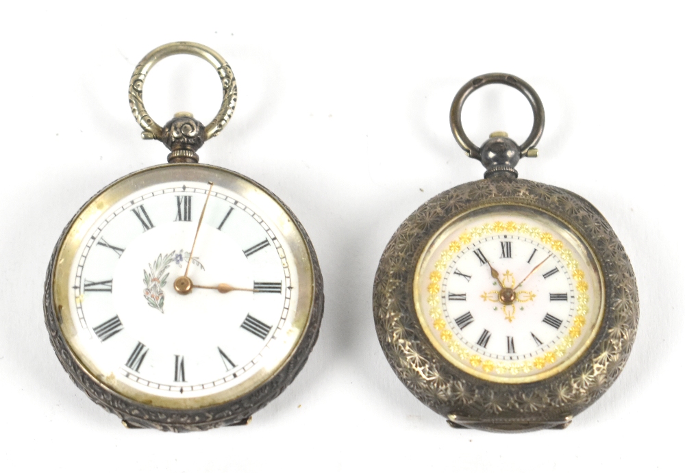 A 935 grade silver key wind lady's fob watch, the enamel dial with gilt floral detail surrounding