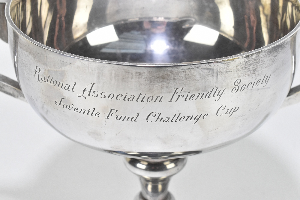 WILLIAM ADAMS LTD; a George VI hallmarked silver twin handled trophy cup with engraved - Image 2 of 4