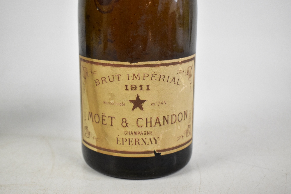 CHAMPAGNE; a bottle of Moet & Chandon Brut Imperial 1911 and a further bottle of Moet & Chandon, - Image 3 of 4