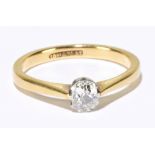 An 18ct yellow gold diamond solitaire ring, the cushion cut stone weighing approx. 0.25cts in ten