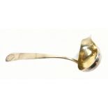 A 19th century white metal small ladle, with applied shell to the terminal above engrave initials '