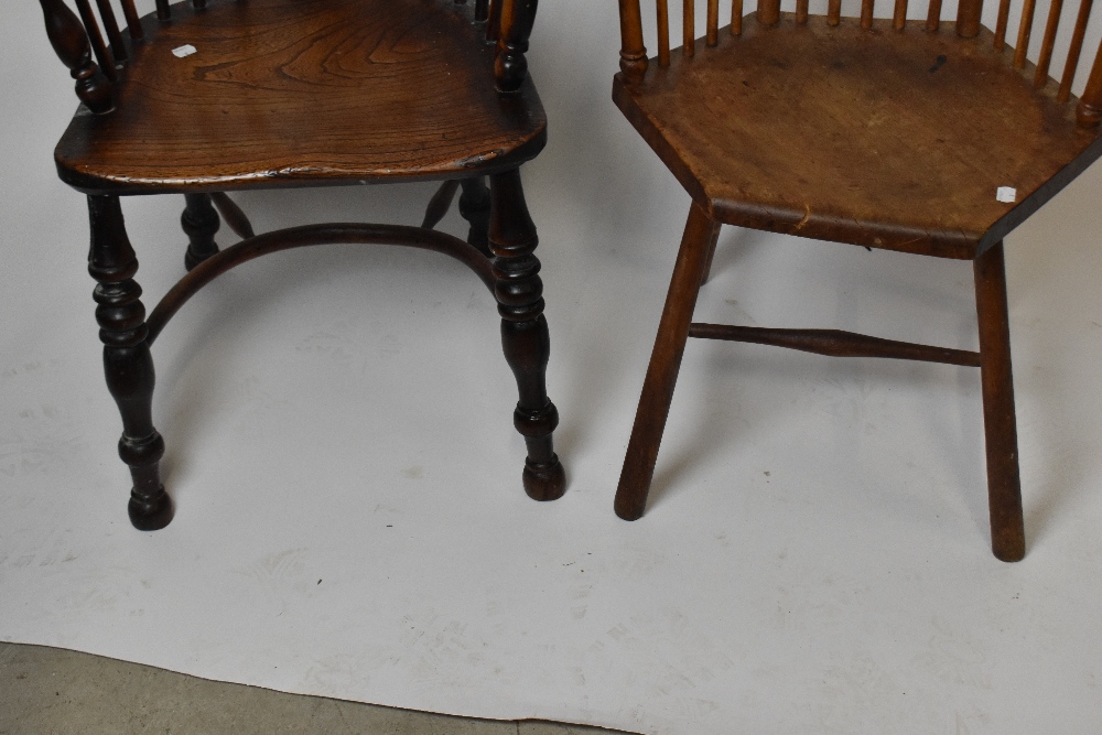An 18th century elm and yew wood low Windsor armchair with crinoline stretcher, and a hexagonal - Image 4 of 4