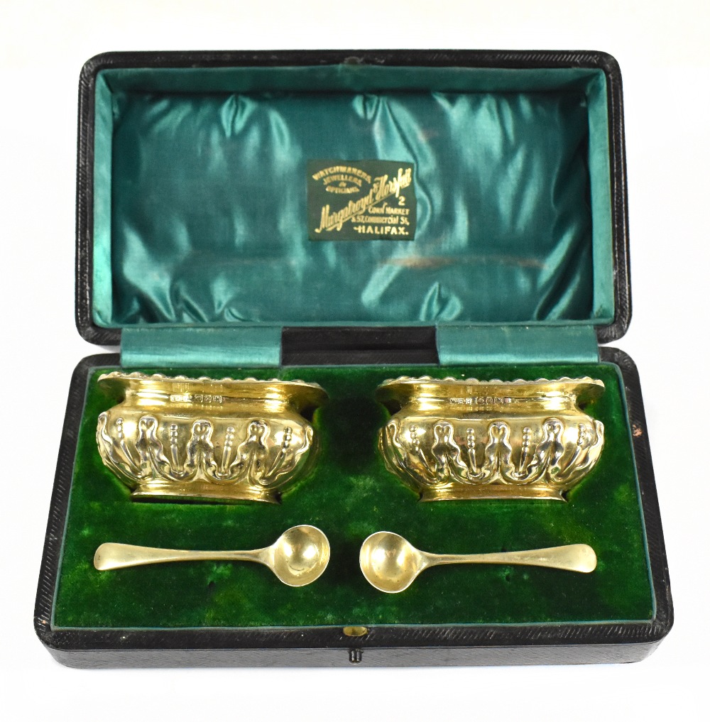 WILLIAM HAIR HASELER; a pair of late Victorian hallmarked silver gilt open salts with gadrooned