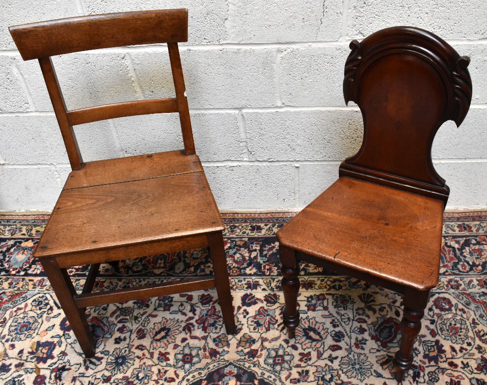 Three 19th century oak country kitchen chairs, with solid seats on tapered legs, with a Victorian