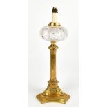 WALKER & HALL; a gilt metal Corinthian column oil lamp with cut glass reservoir (converted to