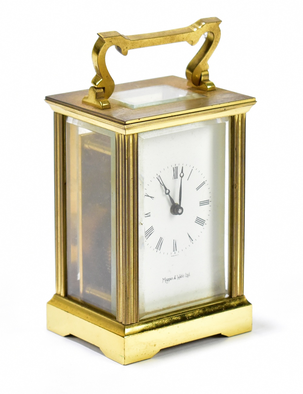 MAPPIN & WEBB; a brass cased carriage clock, the enamel dial set with Roman numerals, height