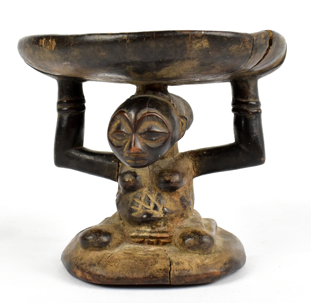 A Luba, Zaire small carved stool, height 15cm. Provenance: private collection UK.